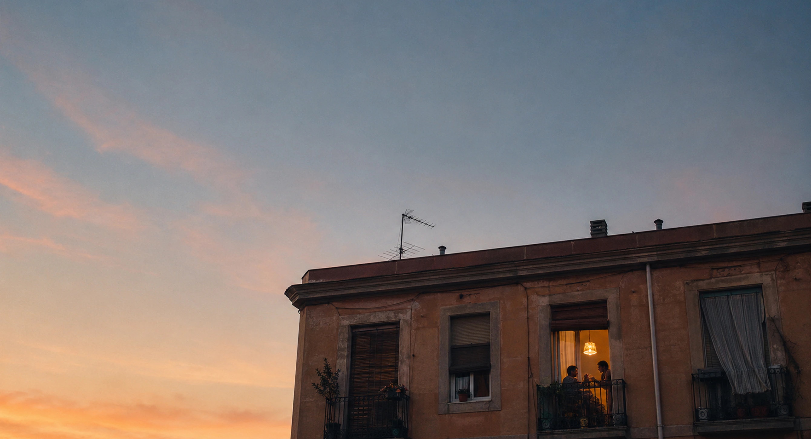 Facade of a Barcelona building at dusk